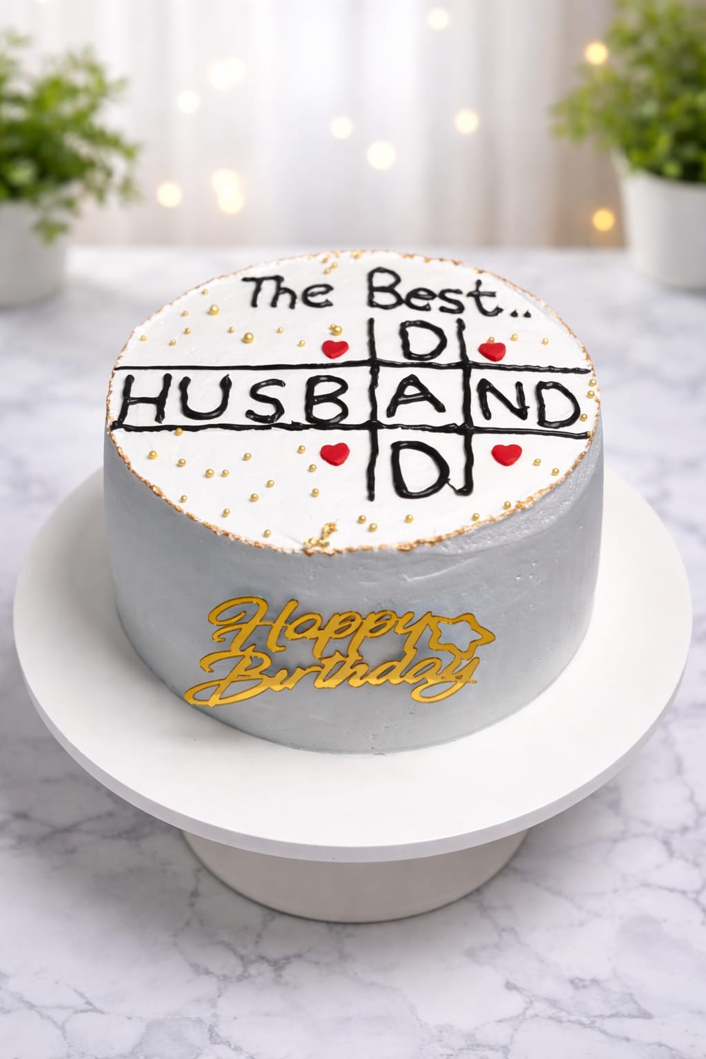 Grey ombre cake with a tic-tac-toe style 'The Best Husband Dad' fondant design, red hearts and gold pearls, a custom theme cake for fathers in Bahrain.